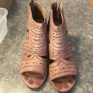 Nice shade of pink. Like new. Back zip. Size 10.